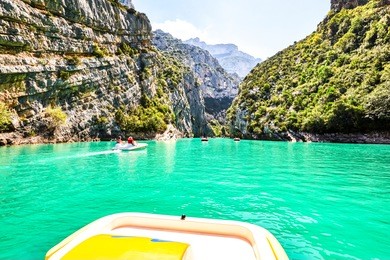 st croix lake, les gorges du verdon with tourists in kayaks, boats and paddle boats., provence, france
