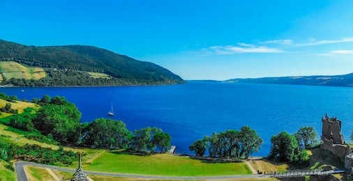 urquhart castle at loch ness in the scottish highlands - aerial view