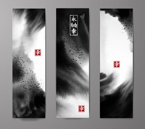 banners with abstract black ink wash painting on white background. traditional japanese ink painting sumi-e. contains hieroglyphs - eternity, freedom, happiness.