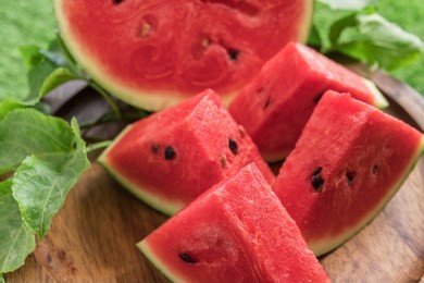 fresh sliced watermelon wooden background, slices of watermelons on cutting board