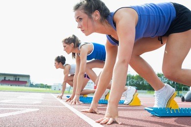 women ready to race on track field