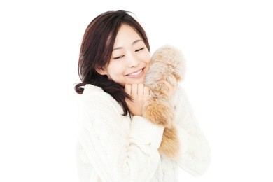 beautiful winter woman on white background. portrait of asian.