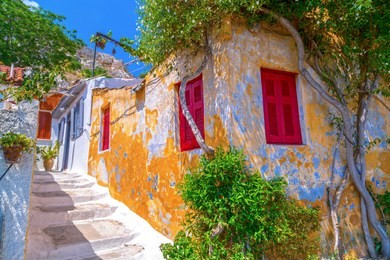 architectural details from the narrow streets of anafiotika, a traditional village in athens, the greek capital. old neighborhood on the slopes of acropolis, greece.