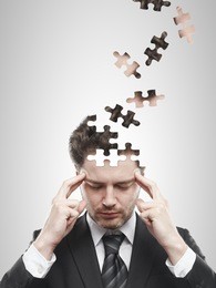 head puzzles businessman  on a white background