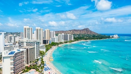 waikiki beach and diamond head crater including the hotels and buildings in waikiki, honolulu, oahu island, hawaii. waikiki beach in the center of honolulu has the largest number of visitors in hawaii