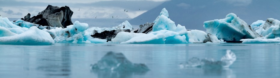 icebergs floating near the vatnajökull glacier in southern iceland. these icebergs broke/calved off the glacier and are on their way out into the arctic sea. 