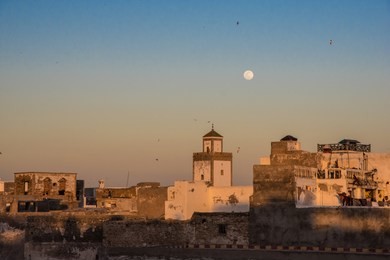 sunset over the medina in essaouira, morocco