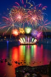 beautiful fireworks on the ocean at english bay vancouver downtown,canada