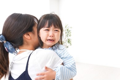 crying child and mother