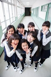 japanese students who stand in the corridor