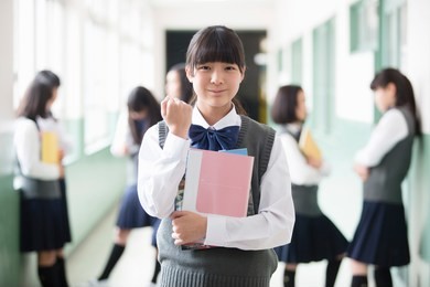 smiljapanese students who stand in the corridore of japanese student