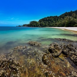 tropical island. a part of beautiful kapas island, malaysia with unique formation rocks and clear water,
long exposure photography.