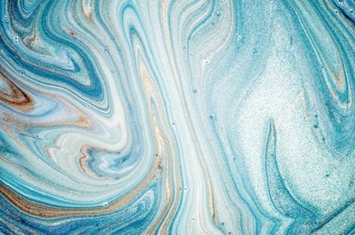 abstract ocean- art. natural luxury. style incorporates the swirls of marble or the ripples of agate. very beautiful blue paint with the addition of gold powder.