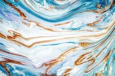 abstract ocean- art. natural luxury. style incorporates the swirls of marble or the ripples of agate. very beautiful blue paint with the addition of gold powder.