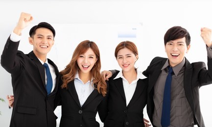 portrait of  happy young business team in office