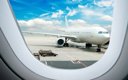 the plane at the airport on loading