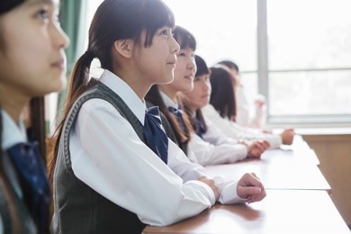 japanese female students to sit in the classroom
