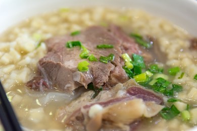 a delicious lamb paomo, a shaanxi cuisine found in xi'an, served in a restaurant in xi'an, china