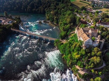 rhine falls (rheinfall) waterfalls with schloss laufen castle, neuhausen near schaffhausen, canton schaffhausen, switzerland, europe