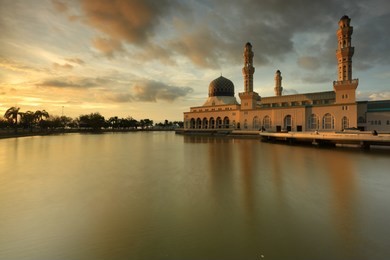 beautiful view of bandaraya kota kinabalu mosque (masjid bandaraya mbr) at likas, kota kinabalu, sabah during sunset.