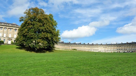 the georgian era royal crescent seen from victoria park in bath england