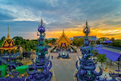 beautiful public buddhist church at wat rong sua ten in chiang rai, thailand. wat rong suea ten (temple of tigers leaping over channel) or the blue temple is above all its magnificent blue interior.