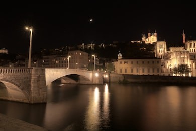 lyon notre-dame de fourviere basilica with saone river at night, france