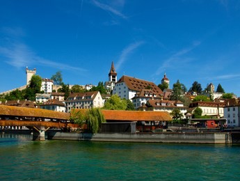 
view of spreuer bridge and old lucerne through reuss river, switzerland