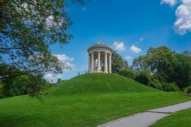 monopteros in the english garden in munich. it is a circular colonnade supporting a roof but without any walls. munich, bavaria, germany, europe.