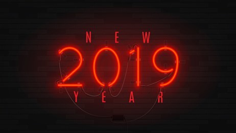 neon web banner for happy new year 2019. retro neon red billboard on brick wall. concept of holiday card with glowing text.