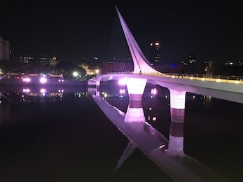 argentina, buenos aires,  bridge of the woman, reflection in river at night