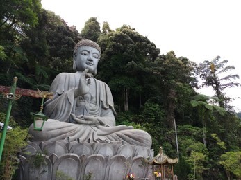 a buddha statue at the chin swee caves in malaysia in the genting highlands. 