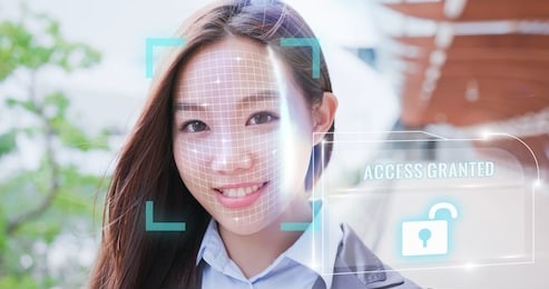 woman use smart phone unlocking with biometric facial identification