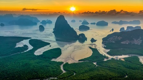 aerial view  phang nga bay at sunrise with mangrove tree forest and hills in the andaman sea, thailand
