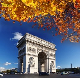 famous arc de triomphe in autumn, paris, france