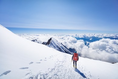 mountaineer enjoing view from mont blanc