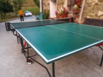 ping pong sport table tennis in a garden outdoor park