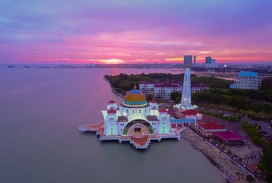 aerial view of majestic malacca straits mosque during magnificent sunset