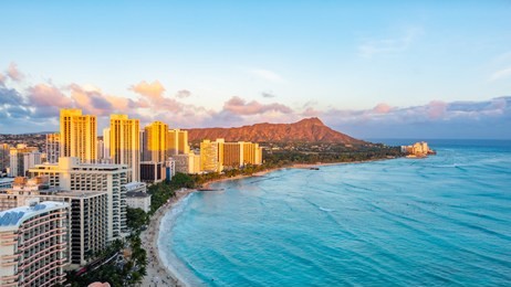 waikiki beach and diamond head crater including the hotels and buildings in waikiki, honolulu, oahu island, hawaii. waikiki beach in the center of honolulu has the largest number of visitors in hawaii