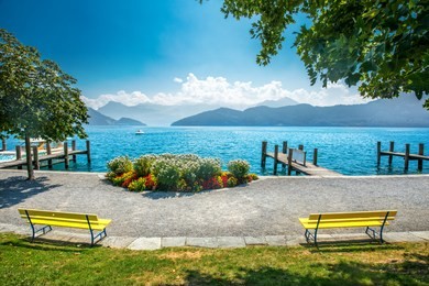 village weggis, lake lucerne (vierwaldstatersee), pilatus mountain and swiss alps in the background near famous lucerne (luzern) city, switzerland