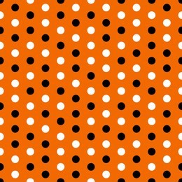 halloween polka dots seamless pattern - black and white dots on orange background