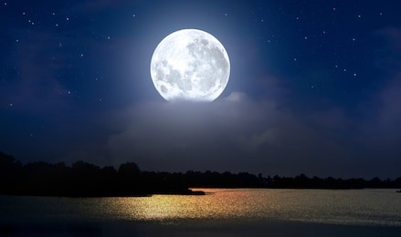 full moon over the night lake