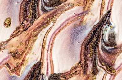 luxury seamless marbling in eastern style. natural pattern. style incorporates the swirls of marble or the ripples of agate for a luxe effect. magic marble art. coral colors with golden powder. 