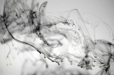 abstract formation black ink in a water on white background