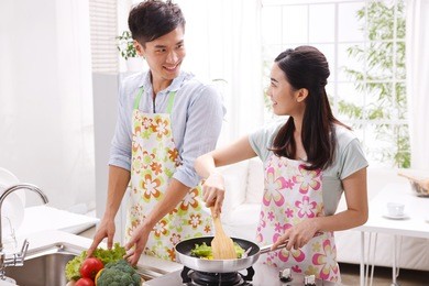 young couple in kitchen