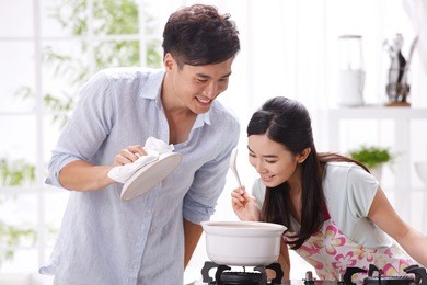 young couple in kitchen