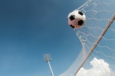 soccer ball in goal, success concept