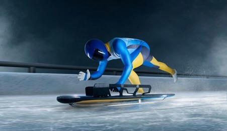 skeleton sport. the athlete descends on a sleigh on an ice track. winter sports