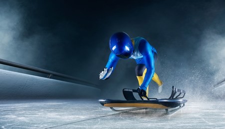 skeleton sport. the athlete descends on a sleigh on an ice track. winter sports