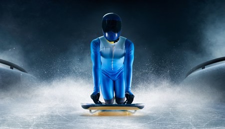 skeleton sport. the athlete descends on a sleigh on an ice track. winter sports